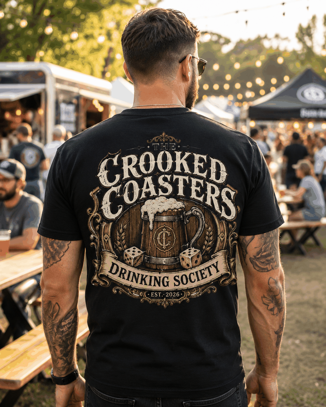 Crooked Coasters Drinking Society T-shirt, Black tee modeled outdoors from the back