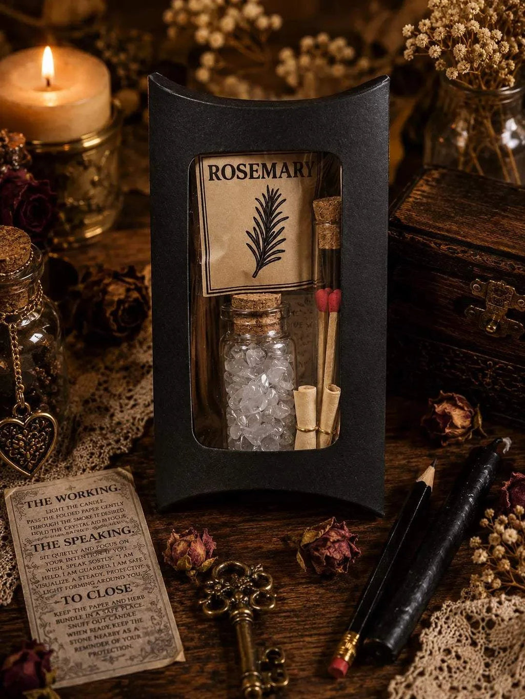 The Warding Spell Kit in a black keepsake box with rosemary, clear quartz chips, matches, ritual scroll, and candle